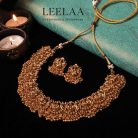 1 Lakshmi Multi stone & golden beads necklace with earrings